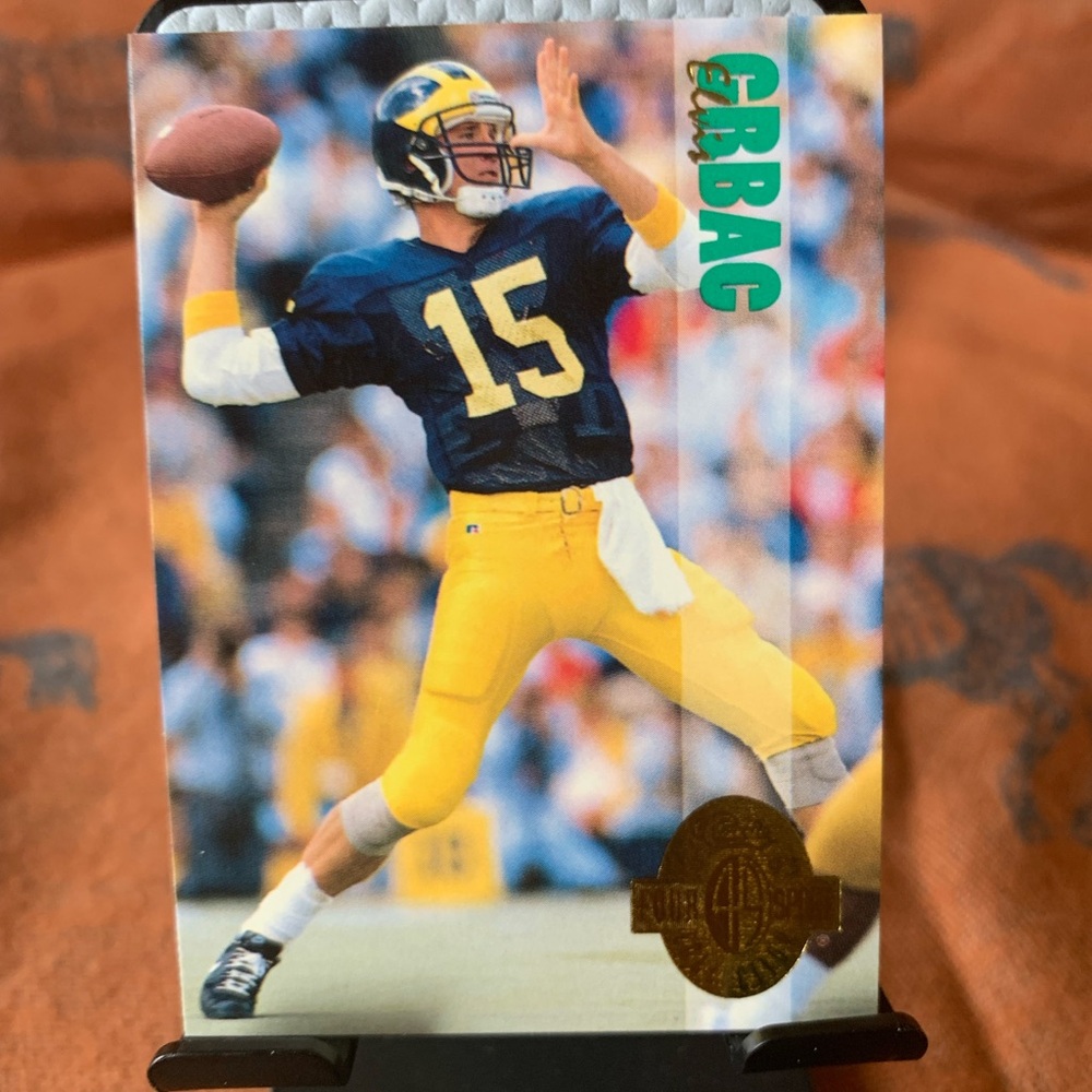 Football Trading Card with Player in Blue and Yellow Uniform